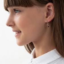 Замена сережек после прокола на постоянные серьги